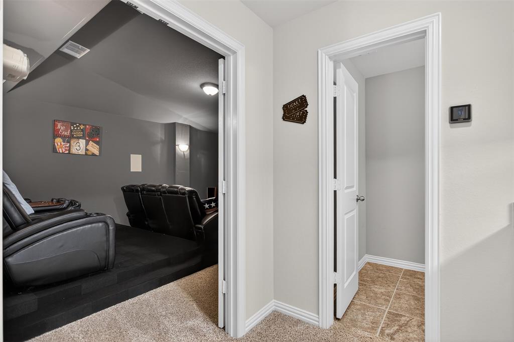 1010 Longhill Way Forney, TX 75126 - Photo 25 of 38 a view of a hallway with elevator