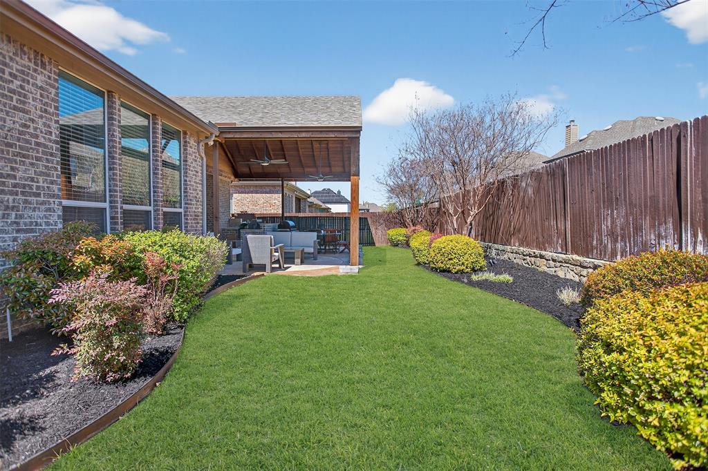 1010 Longhill Way Forney, TX 75126 - Photo 31 of 38 a garden view with a seating space