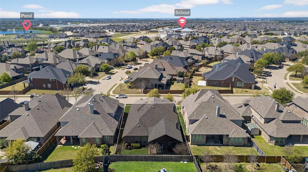 1010 Longhill Way Forney, TX 75126 - Photo 33 of 38 an aerial view of a house with a swimming pool