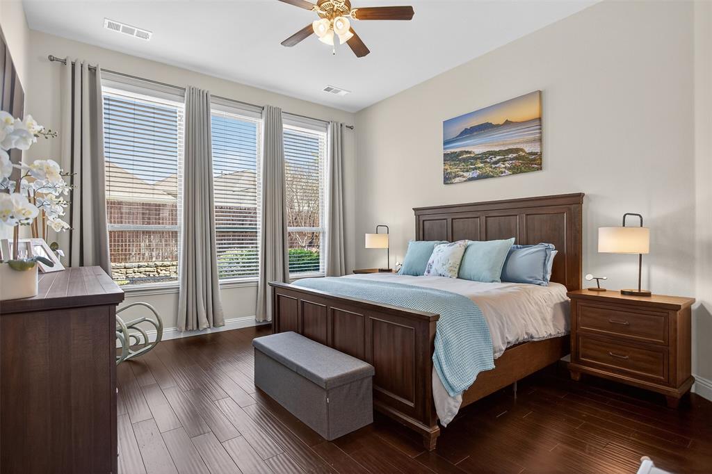 1010 Longhill Way Forney, TX 75126 - Photo 4 of 38 a bedroom with a bed and a large window