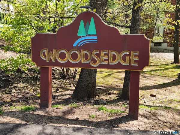 a sign broad on the side of the road