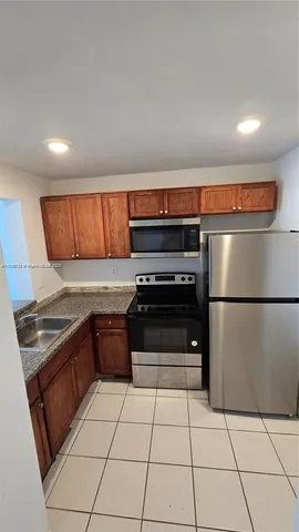 $153,450 | 498 Northwest 165th Street, Unit D407, Miami, FL 33169