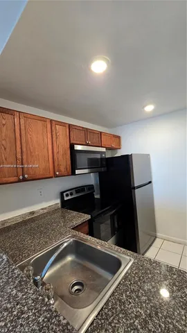 $153,450 | 498 Northwest 165th Street, Unit D407, Miami, FL 33169