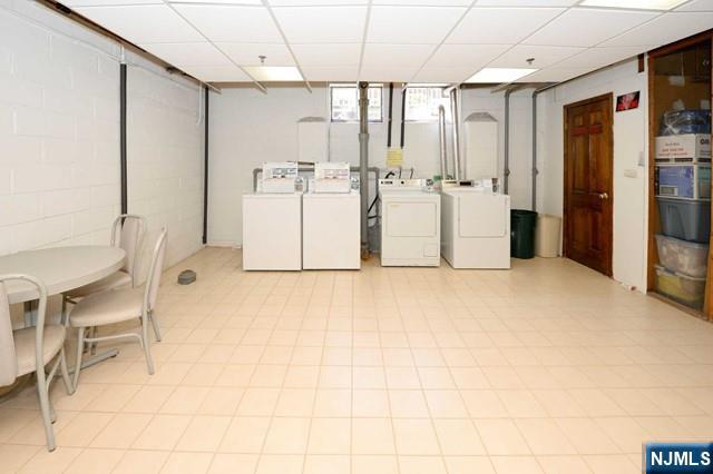 20-30 Ridge Road, Unit A11 Ridgewood, NJ 07450 - Photo 12 of 16 a view of kitchen with furniture and refrigerator