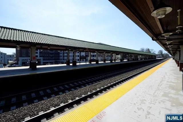 a front view of a building with many windows