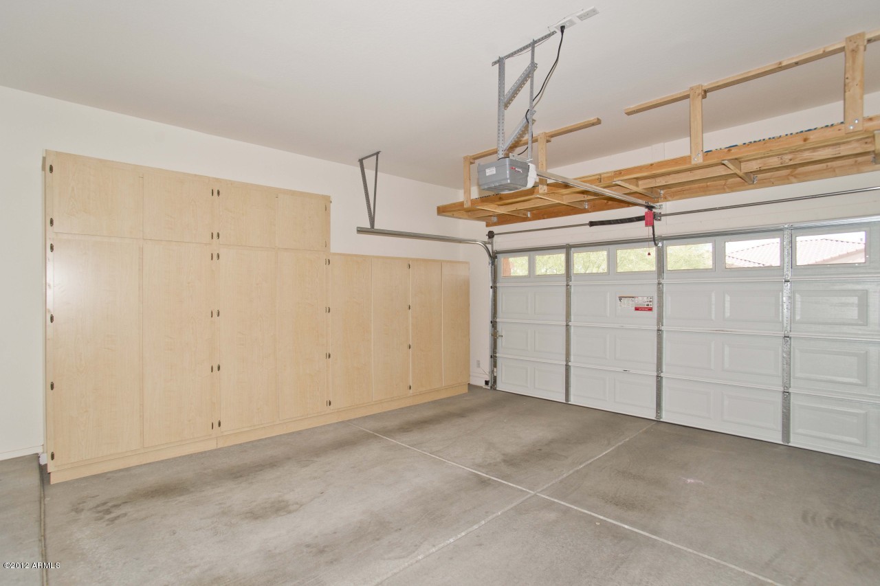2513 West Corral Road Phoenix, AZ 85041 - Photo 14 of 16 Garage Cabinets