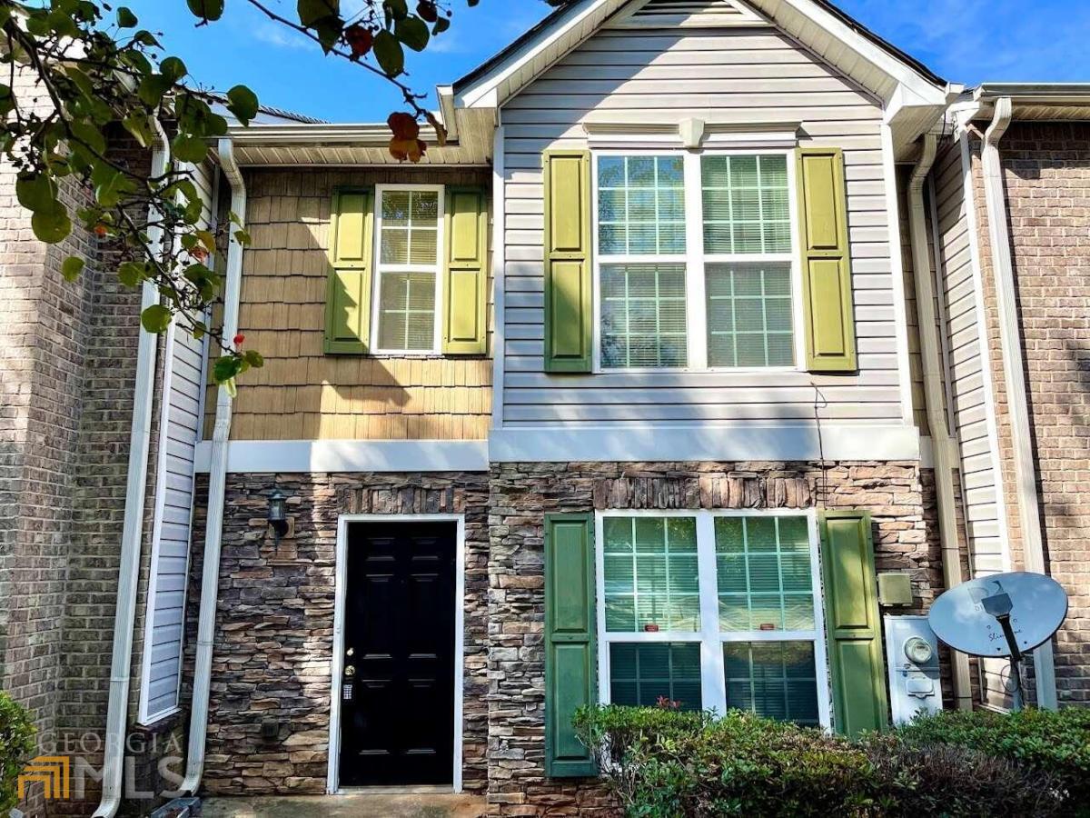 3445 Waldrop Trail Decatur, GA 30034 - Photo 1 of 1 a front view of a house with large windows