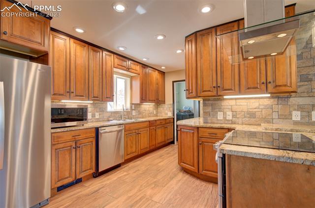 7845 Wilson Road Fountain, CO 80817 - Photo 15 of 30 Remodeled kitchen with granite counters