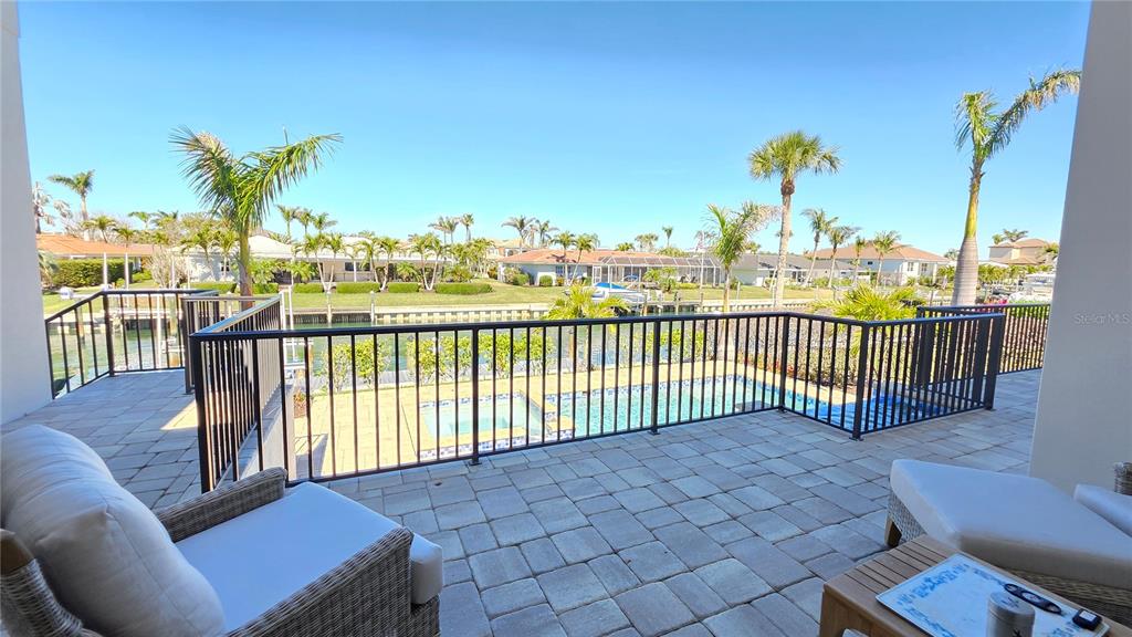 531 Birdie Lane Longboat Key, FL 34228 - Photo 36 of 43 a view of a balcony with lake view