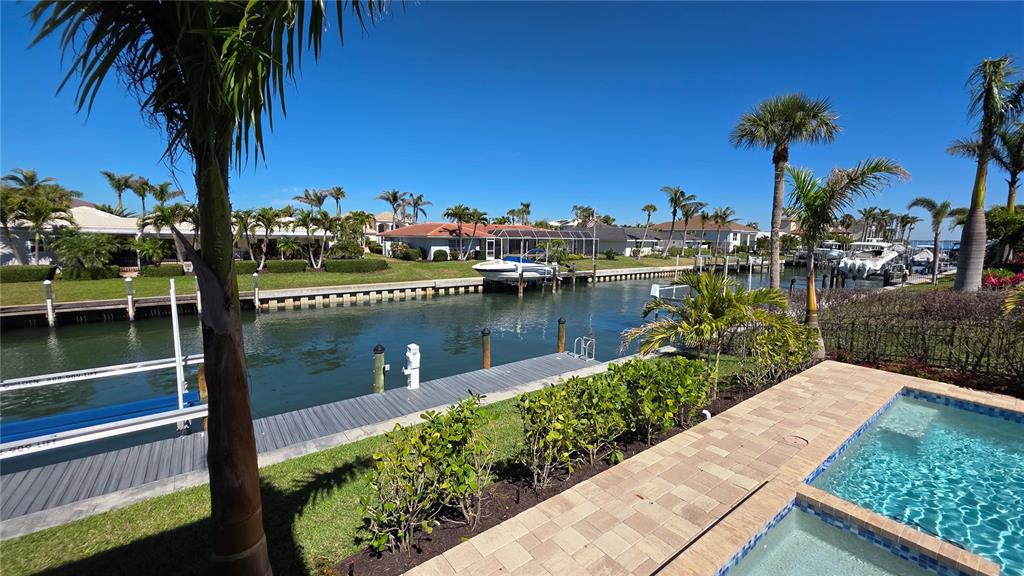 531 Birdie Lane Longboat Key, FL 34228 - Photo 37 of 43 a view of a lake
