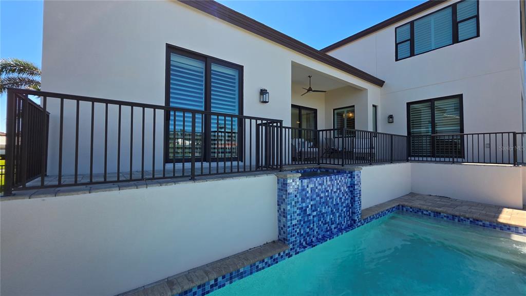 531 Birdie Lane Longboat Key, FL 34228 - Photo 41 of 43 a view of backyard with large trees and wooden fence