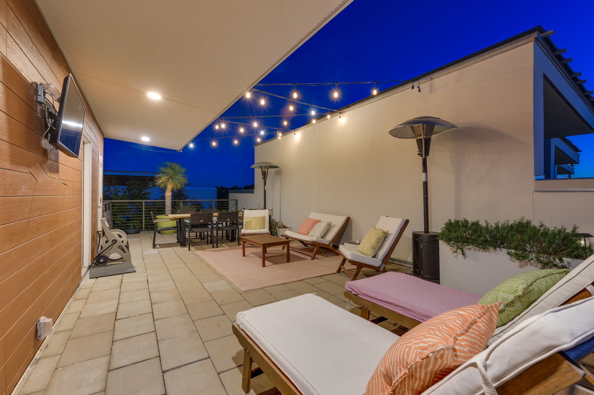 2301 South 5th Street, Unit 5 Austin, TX 78704 - Photo 32 of 39 Rooftop deck for entertaining featuring an outdoor living space