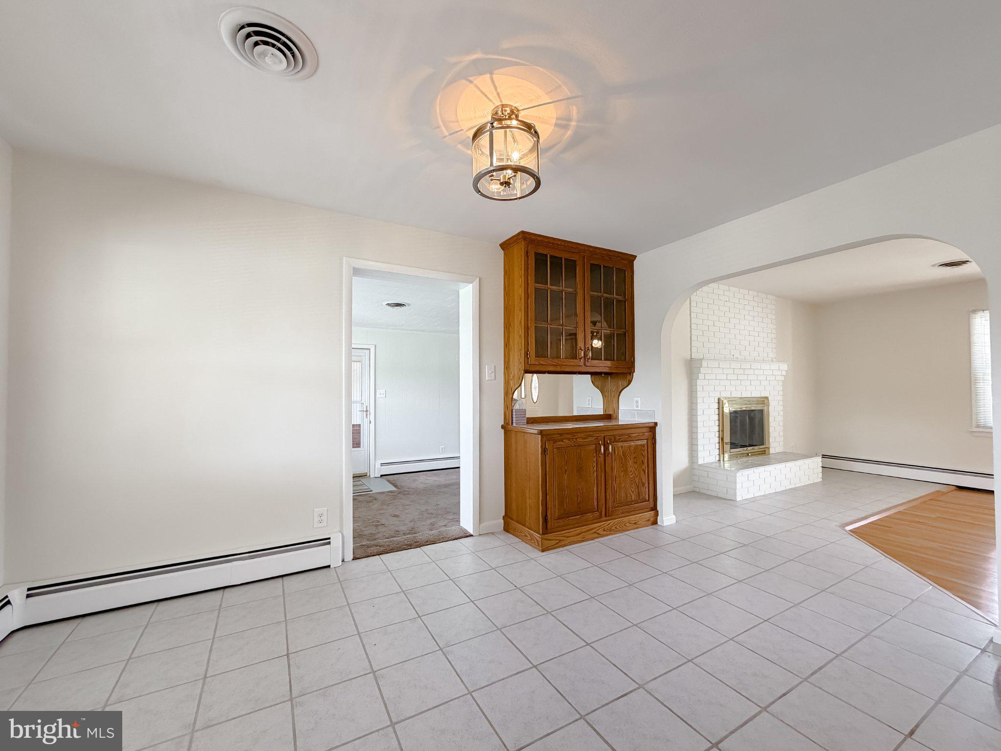 23230 Colton Point Road Avenue, MD 20609 - Photo 16 of 63 Spacious living area with cozy charm.