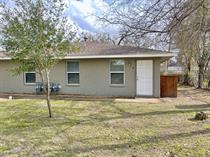 Rear view of property featuring a yard