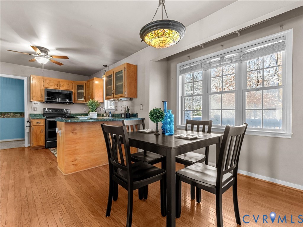 11718 Corte Castle Road Chesterfield, VA 23838 - Photo 15 of 50 Dining area featuring light wood finished floors a