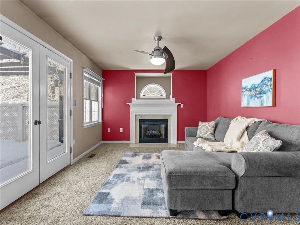 11718 Corte Castle Road Chesterfield, VA 23838 - Photo 26 of 50 Carpeted living area with a fireplace with flush h