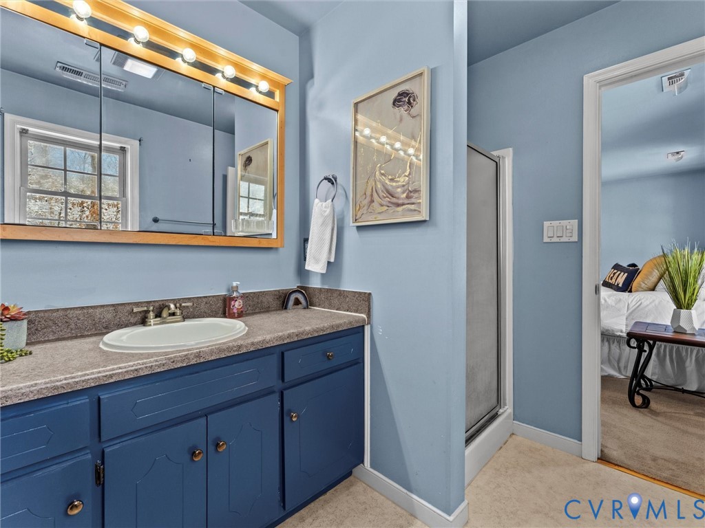 11718 Corte Castle Road Chesterfield, VA 23838 - Photo 34 of 50 Full bathroom with ensuite bath, vanity, light car