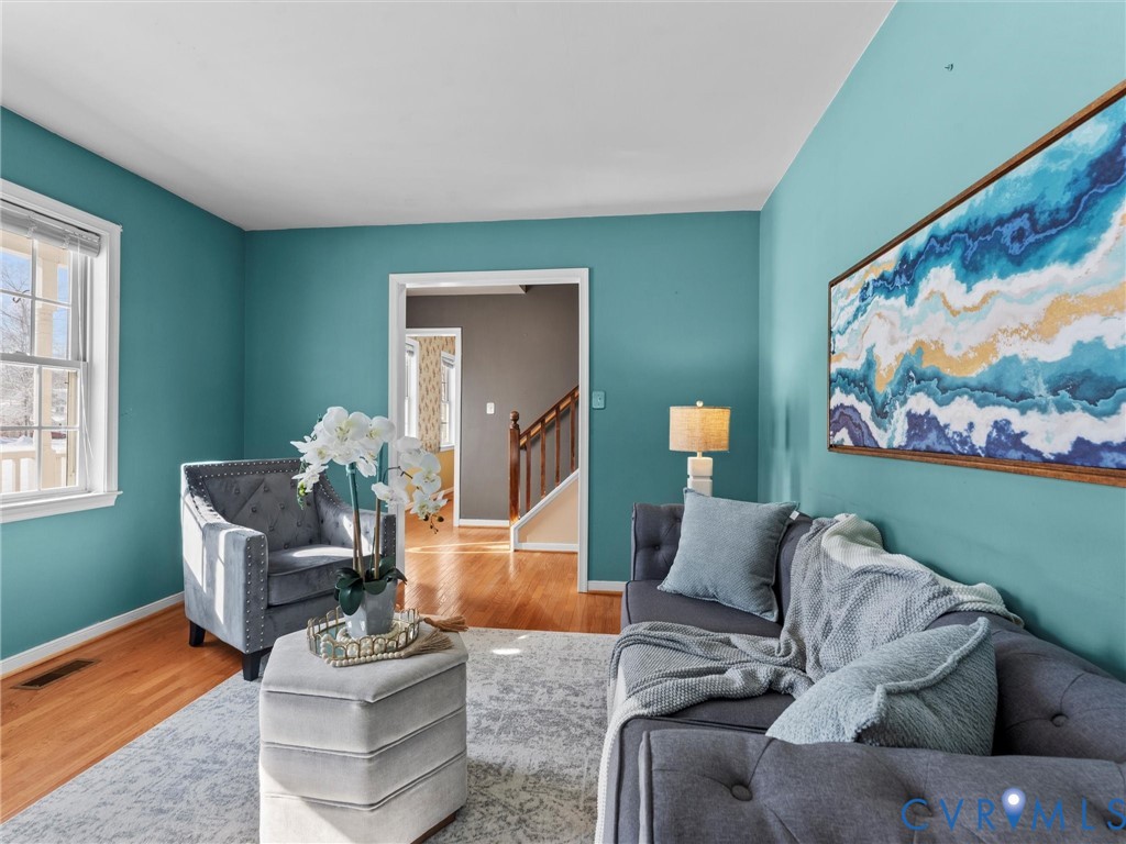11718 Corte Castle Road Chesterfield, VA 23838 - Photo 9 of 50 Living area featuring stairway and wood finished f