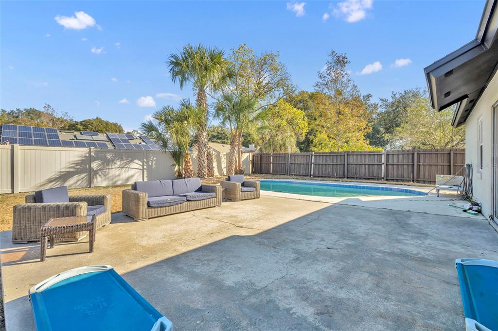 222 West Panama Road Winter Springs, FL 32708 - Photo 19 of 25 a view of a house with swimming pool and sitting area