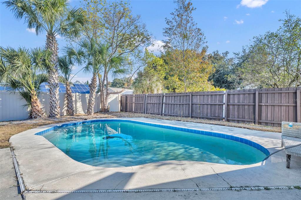 222 West Panama Road Winter Springs, FL 32708 - Photo 20 of 25 a view of a swimming pool with a backyard