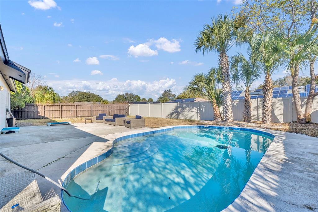 222 West Panama Road Winter Springs, FL 32708 - Photo 21 of 25 a view of swimming pool with outdoor seating and plants