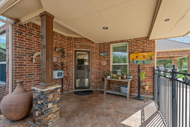 a view of a patio with couches chairs and a fire pit