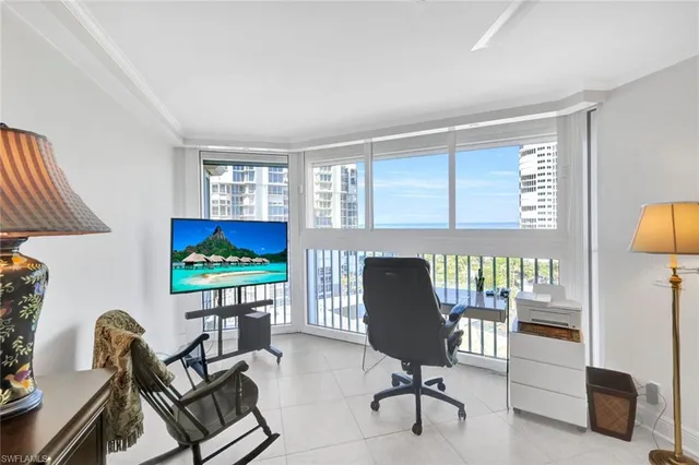 a bathroom with a sink mirror and toilet