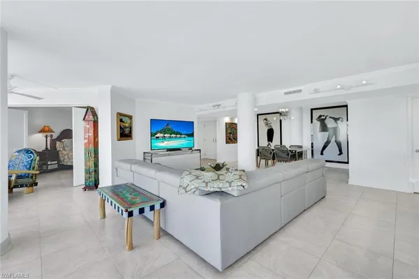a view of a livingroom with furniture and front door
