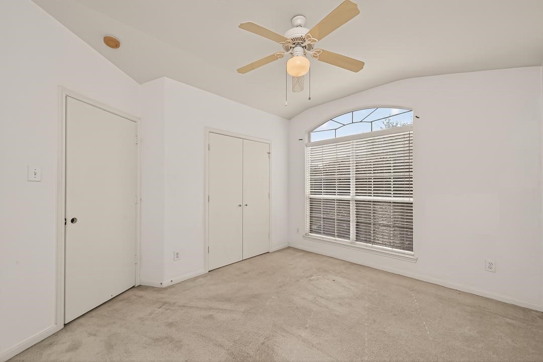 23514 Hidden Maple Drive Spring, TX 77373 - Photo 13 of 23 an empty room with chandelier fan