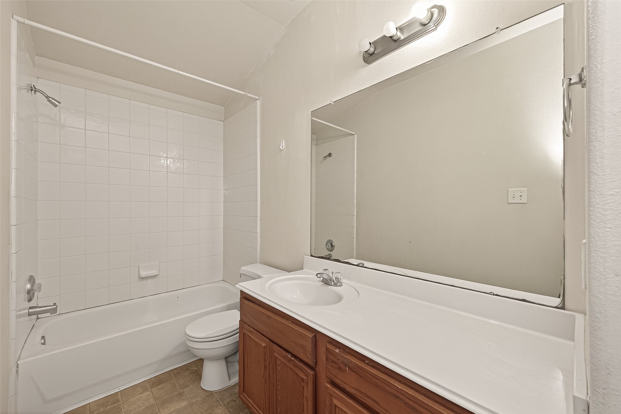 23514 Hidden Maple Drive Spring, TX 77373 - Photo 15 of 23 a bathroom with a sink a toilet and shower
