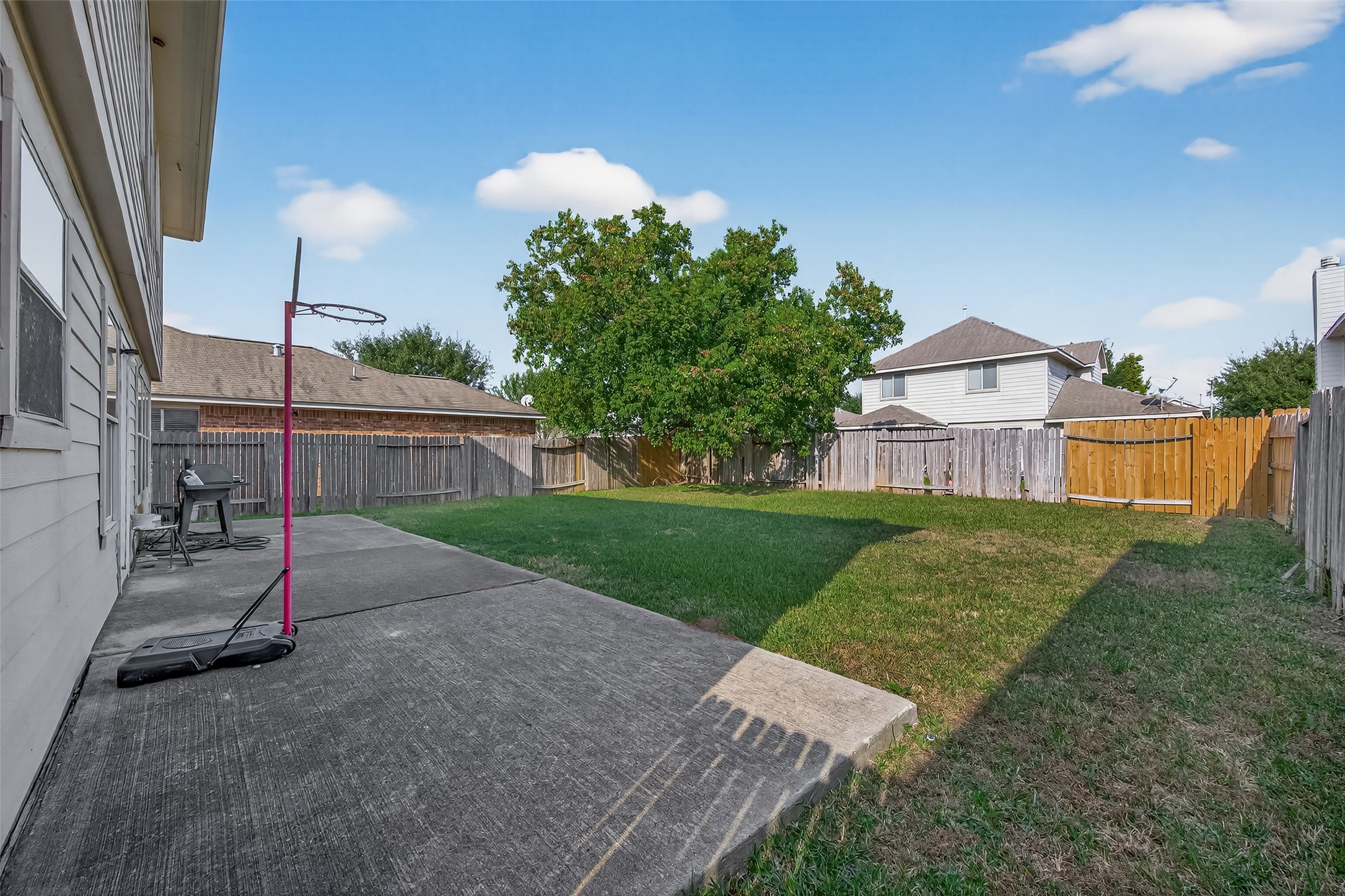 23514 Hidden Maple Drive Spring, TX 77373 - Photo 21 of 23 a view of a house with a yard