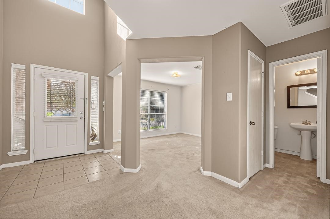 23514 Hidden Maple Drive Spring, TX 77373 - Photo 4 of 23 en view interior of the house and empty room