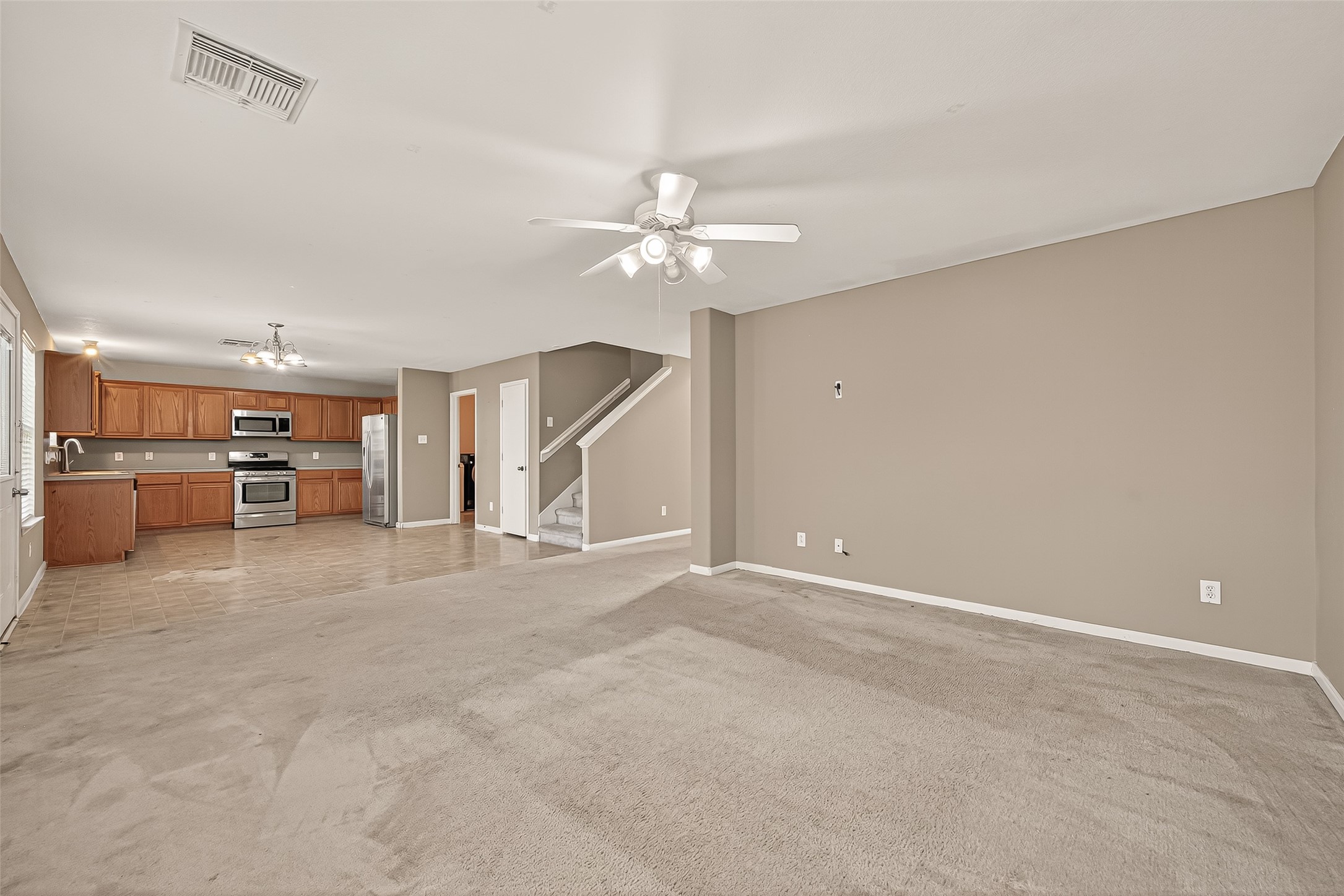 23514 Hidden Maple Drive Spring, TX 77373 - Photo 7 of 23 a view of a livingroom with a ceiling fan