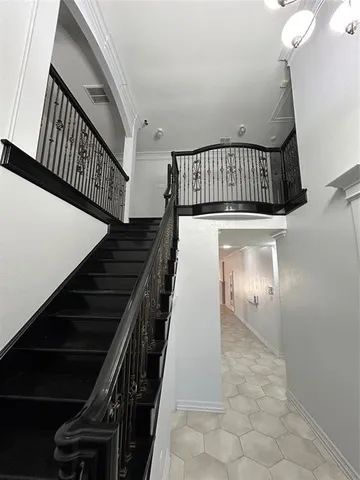 a view of a hallway with entryway