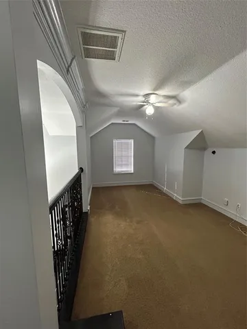 a bathroom with a sink vanity and mirror