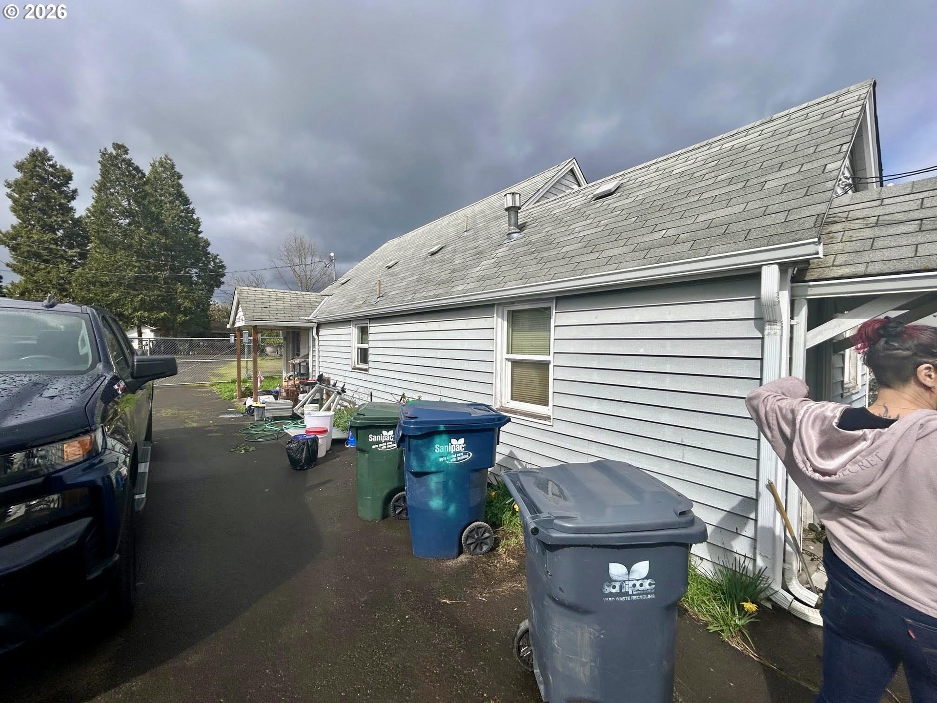 1035 Madera Street Eugene, OR 97402 - Photo 2 of 3 a view of a patio with table and chairs and a barbeque