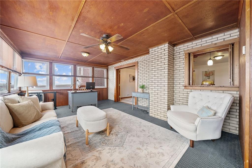 1620 Methyl Street Pittsburgh, PA 15216 - Photo 18 of 45 a living room with furniture and a chandelier