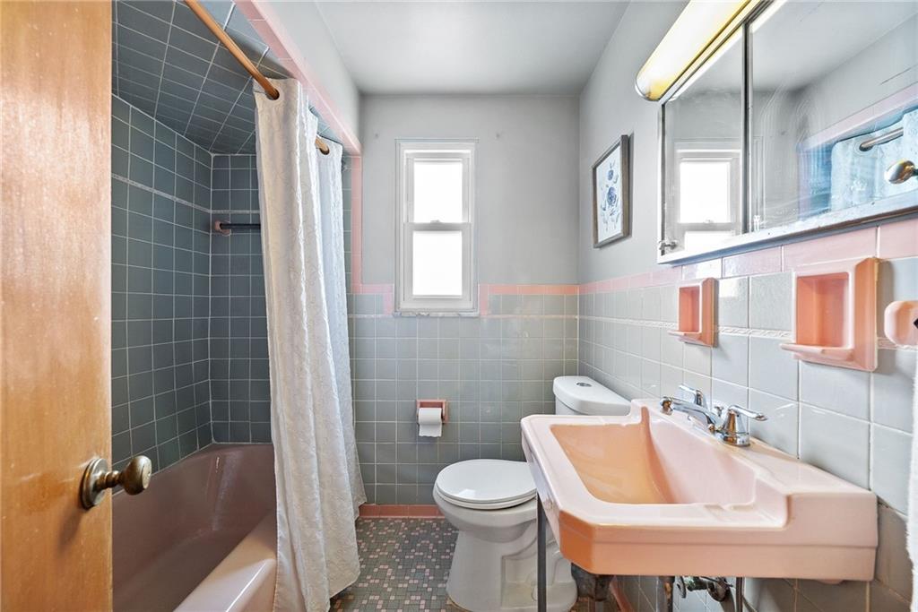 1620 Methyl Street Pittsburgh, PA 15216 - Photo 26 of 45 a bathroom with a sink toilet and shower