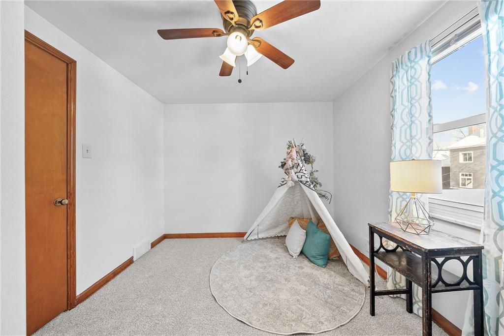 1620 Methyl Street Pittsburgh, PA 15216 - Photo 28 of 45 a view of a livingroom with furniture and a ceiling fan