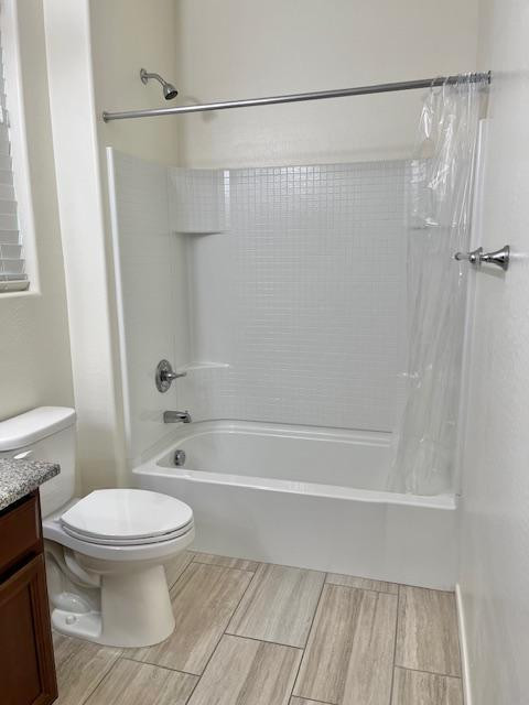 71 West Megan Street Gilbert, AZ 85233 - Photo 17 of 39 a bathroom with a toilet and a shower