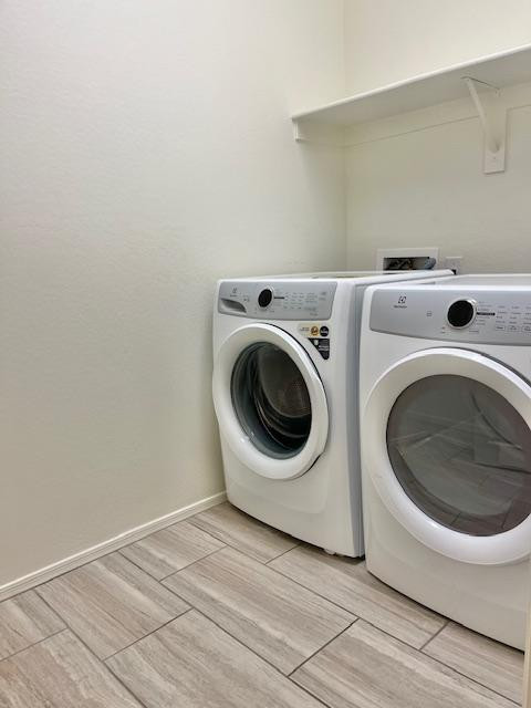 71 West Megan Street Gilbert, AZ 85233 - Photo 21 of 39 a utility room with dryer and washer