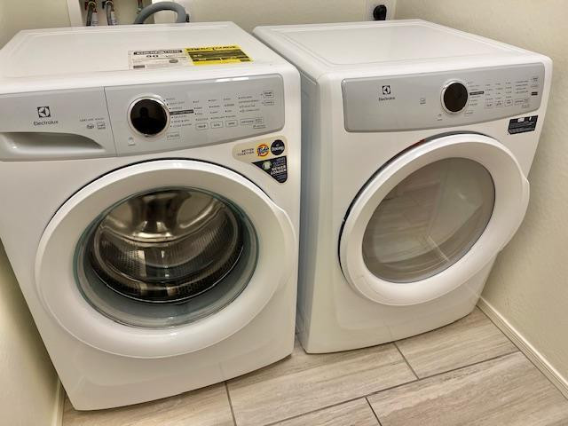 71 West Megan Street Gilbert, AZ 85233 - Photo 22 of 39 a utility room with dryer and washer
