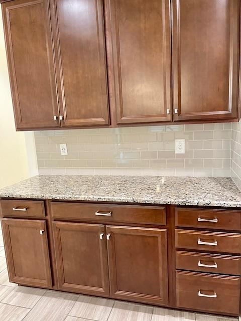 71 West Megan Street Gilbert, AZ 85233 - Photo 10 of 39 a view of cabinets with granite countertop wooden cabinets
