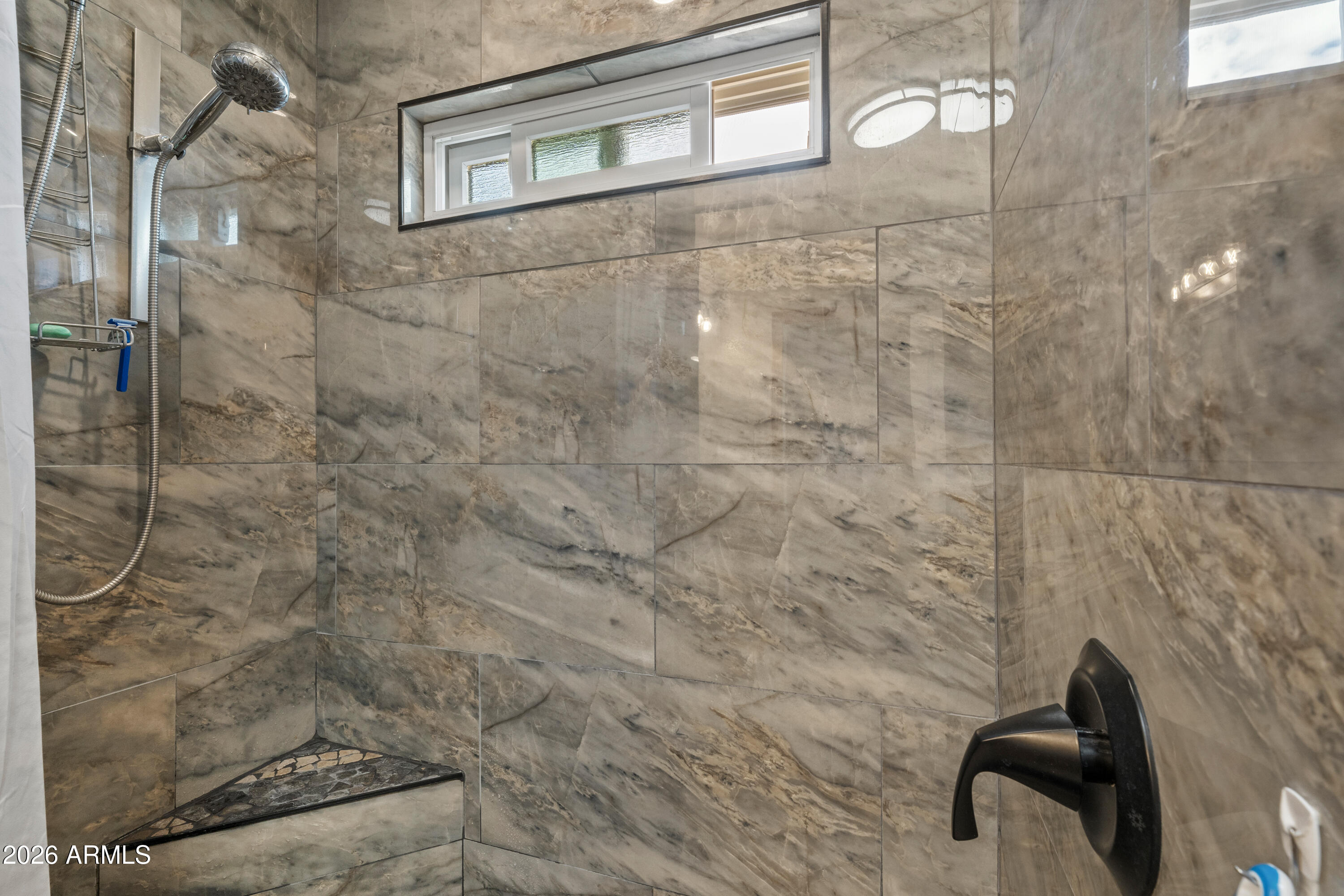 10072 South Shiloh Ranch Road Hereford, AZ 85615 - Photo 18 of 46 a bathroom with a shower