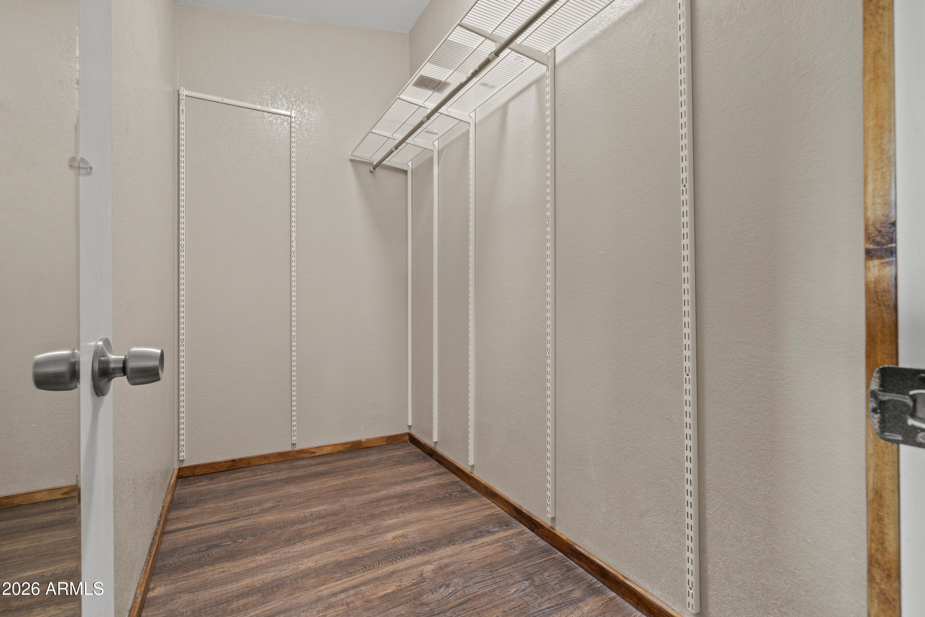10072 South Shiloh Ranch Road Hereford, AZ 85615 - Photo 19 of 46 a view of a room with wooden floor