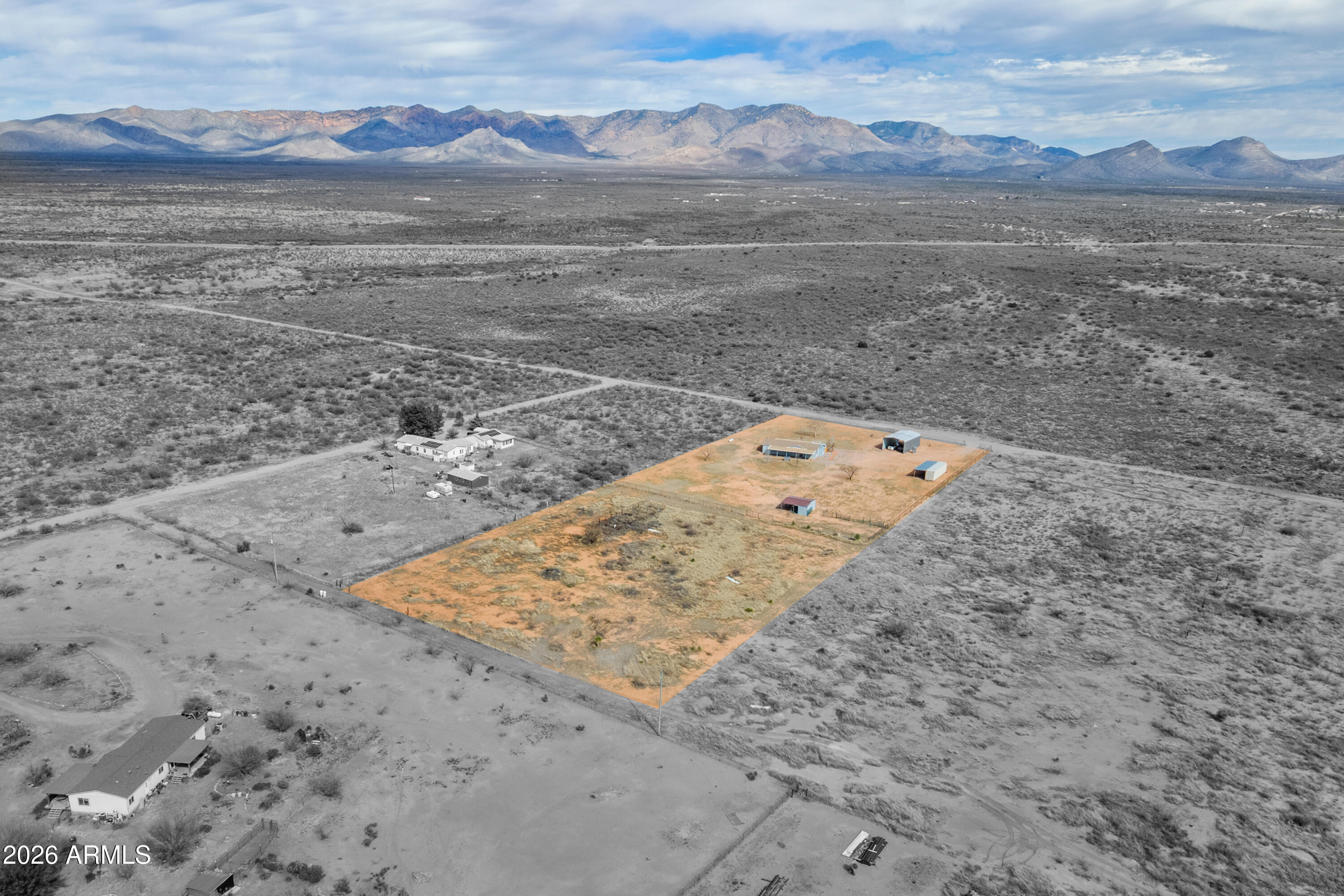 10072 South Shiloh Ranch Road Hereford, AZ 85615 - Photo 2 of 46 a view of a dry yard with trees