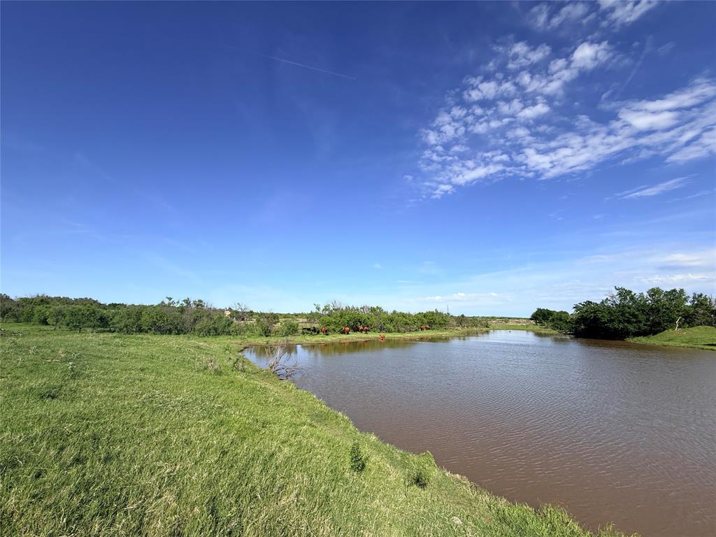 0 Troy Davis Road Olney, TX 76374 - Photo 28 of 37 a view of a lake with houses in the back