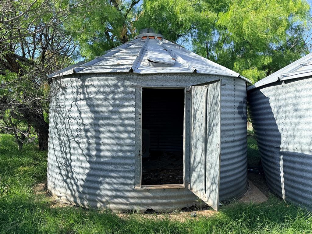 0 Troy Davis Road Olney, TX 76374 - Photo 7 of 37 a view of a small house with a small garden