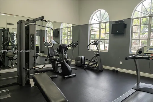 a view of a room with gym equipment