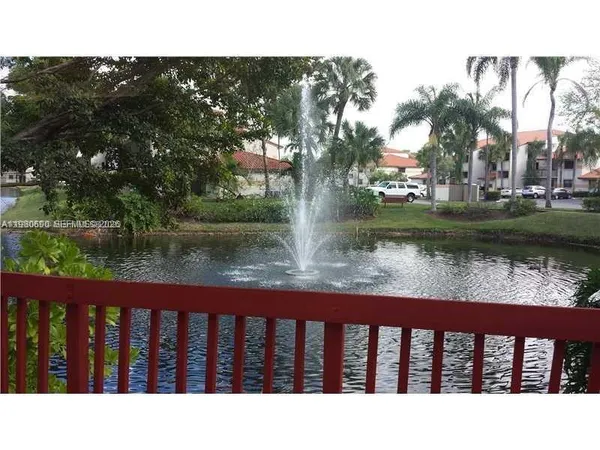 a view of a lake from a balcony